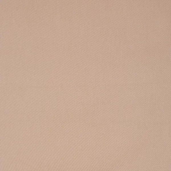 Close up of the colour on the California Dreams, a solid nude rose-pink super king size bedsheet you can buy online at Sukham Home, a sustainable furniture, gardening and home decor store in Kolkata, India