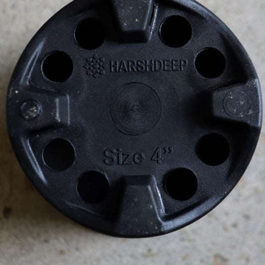 Bottom part of the 5 inch black nursery pot and gardening tools you can buy online at Sukham Home, a sustainable furniture, gardening and home decor store in Kolkata, India