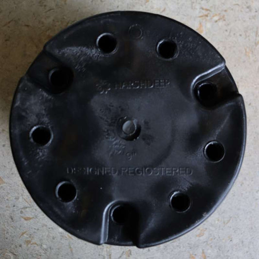 Bottom part of the 9 inch black nursery pot and gardening tools you can buy online at Sukham Home, a sustainable furniture, gardening and home decor store in Kolkata, India