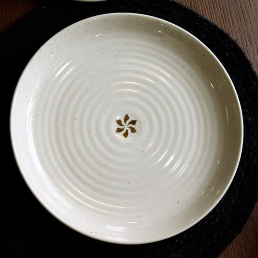 Top view of the Beige Ganga Dinner Plate - a beige and 24-karat gold ceramic plate you can buy online at Sukham Home, a sustainable furniture, gardening and home decor store in Kolkata, India
