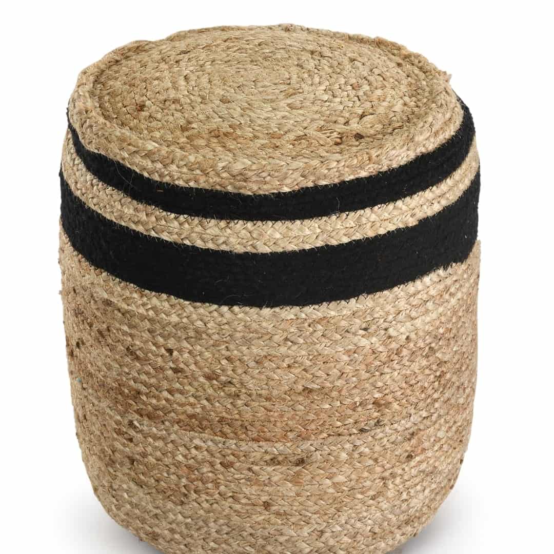 Against a white background, the Jute Pouf with Black Accent, a braided and stitched ottoman made from jute & cotton, available at Sukham Home, a sustainable furniture, kitchen & dining and home decor store in Kolkata, India