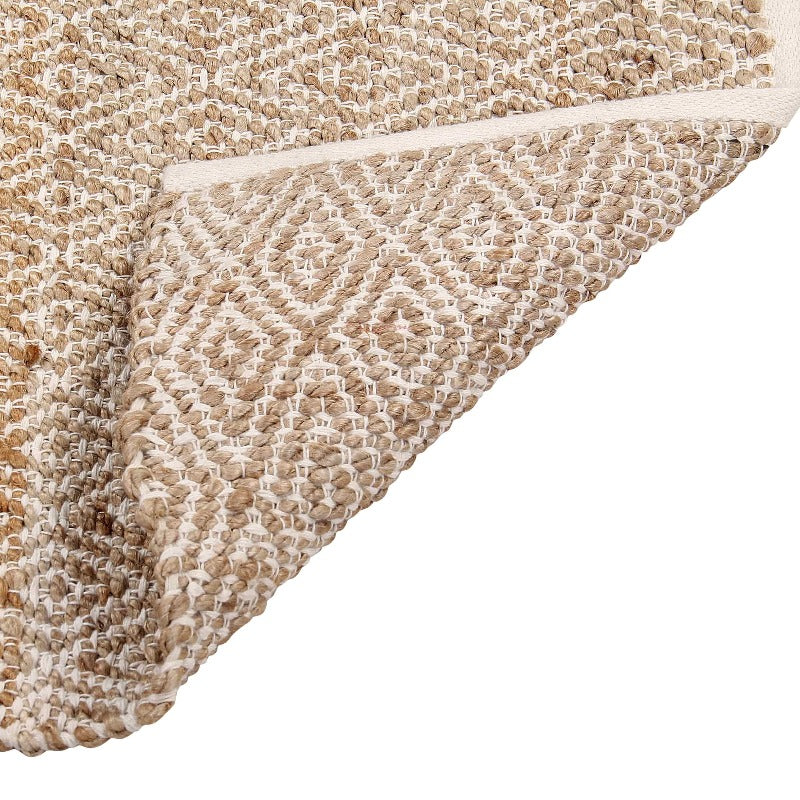 Both sides of the Handwoven Jute Rug with Diamond Design Weaves, a small rectangle jute and white cotton carpet you can buy online at Sukham Home, a sustainable furniture, kitchen & dining and home decor store in Kolkata, India