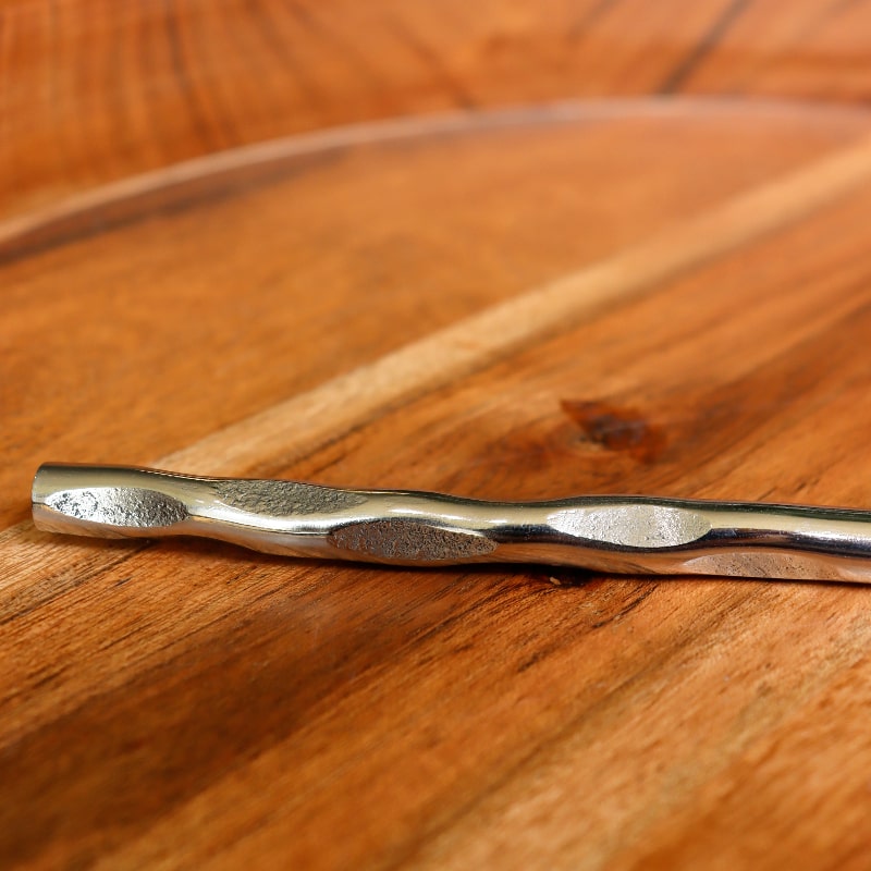 Bottom sculpted design and texture of the Forged Wonder flatware set of stainless steel cutlery you can buy online at Sukham Home, a sustainable furniture, kitchen & dining and home decor store in Kolkata, India