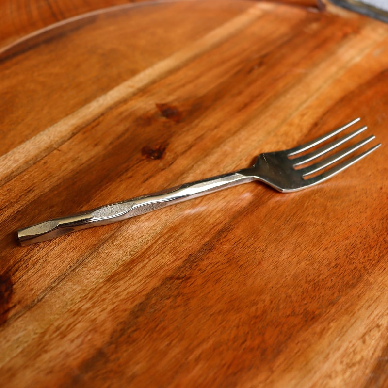 Salad fork of the Forged Wonder flatware set of stainless steel cutlery you can buy online at Sukham Home, a sustainable furniture, kitchen & dining and home decor store in Kolkata, India