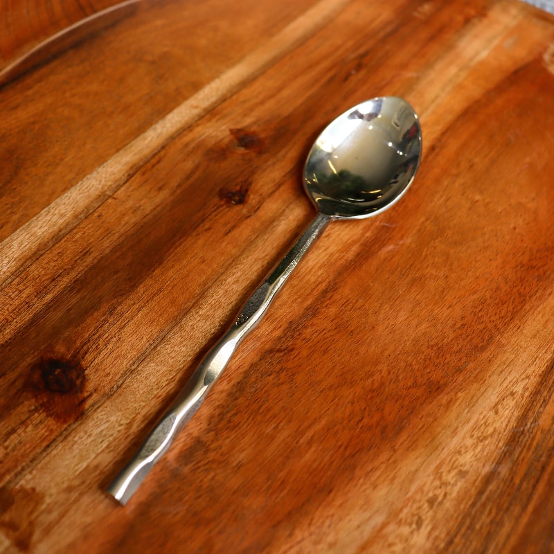 Dinner spoon of the Forged Wonder flatware set of stainless steel cutlery you can buy online at Sukham Home, a sustainable furniture, kitchen & dining and home decor store in Kolkata, India