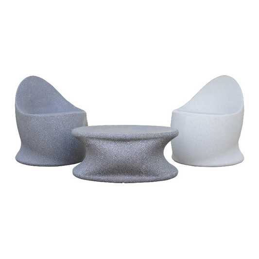 In Grey Stone against a white background, Olivia Table, a stone finish plastic outdoor furniture table you can buy online at Sukham Home, a sustainable furniture, kitchen & dining and home decor store in Kolkata, India
