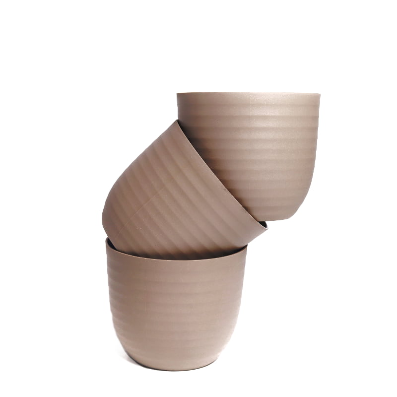 A stack of three brown mocha Verona, a round colourful indoor planter made from plastic that you can buy online at Sukham Home, a sustainable furniture, gardening and home decor store in Kolkata, India
