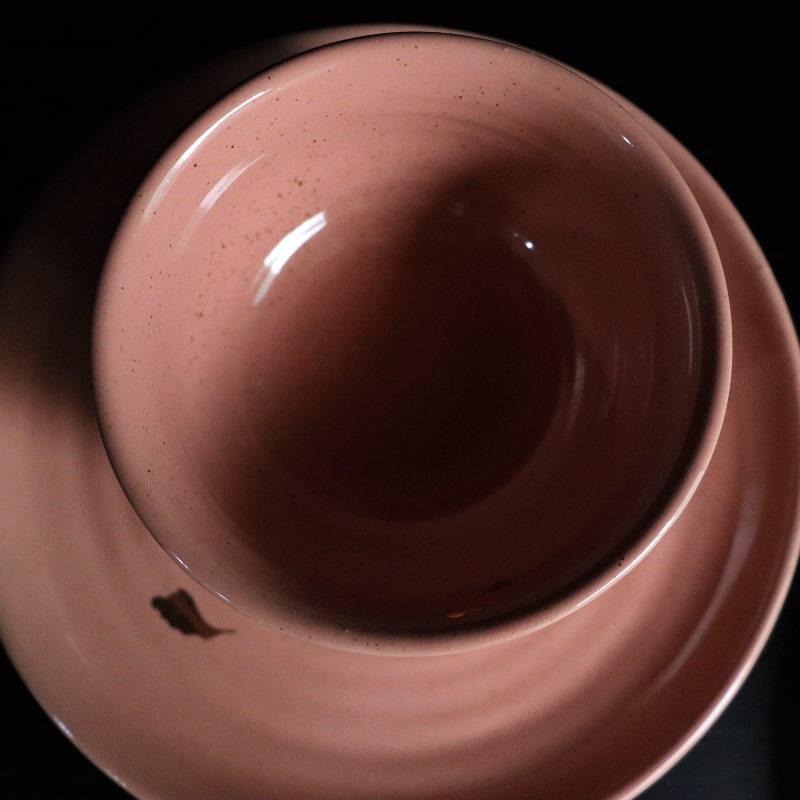 Top view of the Old Rose Ganga Small Bowl, a pink and 24-karat gold ceramic small bowl you can buy online at Sukham Home, a sustainable furniture, gardening and home decor store in Kolkata, India
