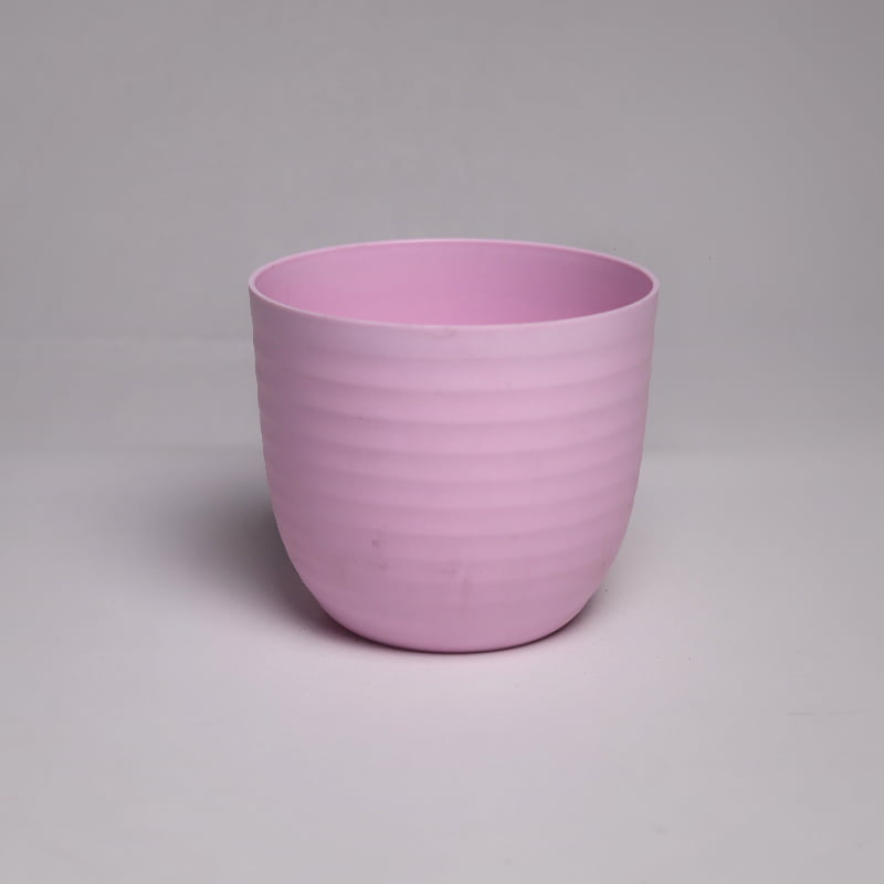 A single pink Verona, a round colourful indoor planter made from plastic that you can buy online at Sukham Home, a sustainable furniture, gardening and home decor store in Kolkata, India