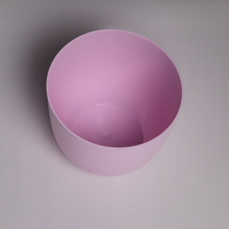 Top view of the pink Verona, a round colourful indoor planter made from plastic that you can buy online at Sukham Home, a sustainable furniture, gardening and home decor store in Kolkata, India