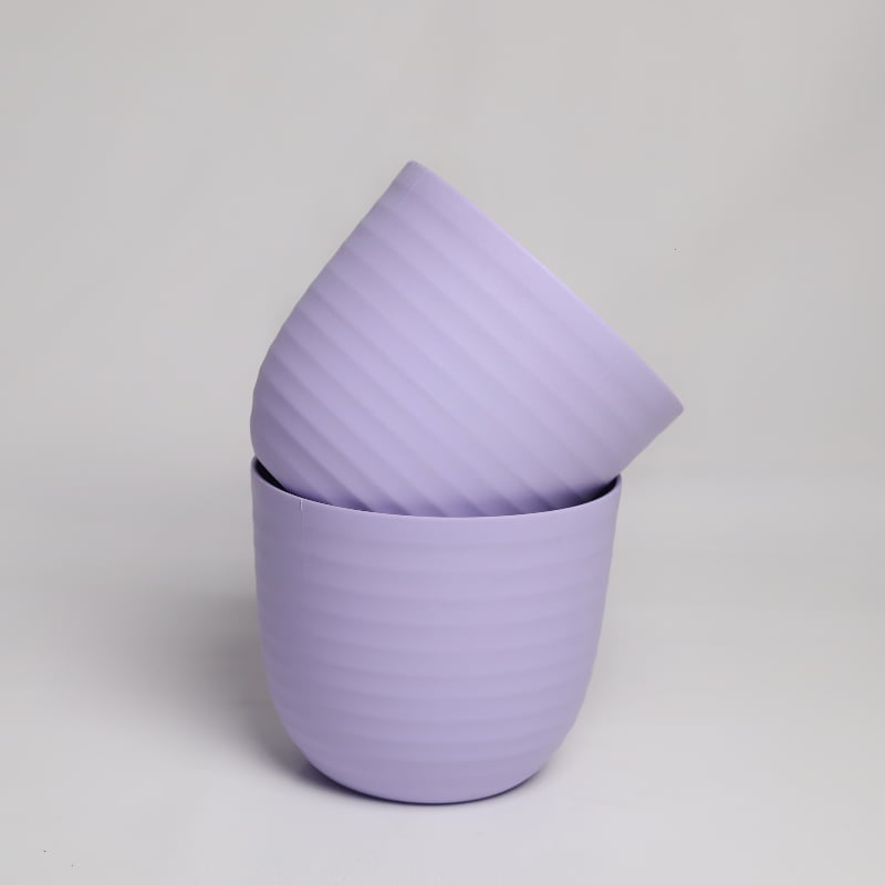 Stack of two purple Verona, a round colourful indoor planter made from plastic that you can buy online at Sukham Home, a sustainable furniture, gardening and home decor store in Kolkata, India
