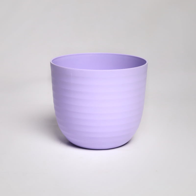 A single purple Verona, a round colourful indoor planter made from plastic that you can buy online at Sukham Home, a sustainable furniture, gardening and home decor store in Kolkata, India