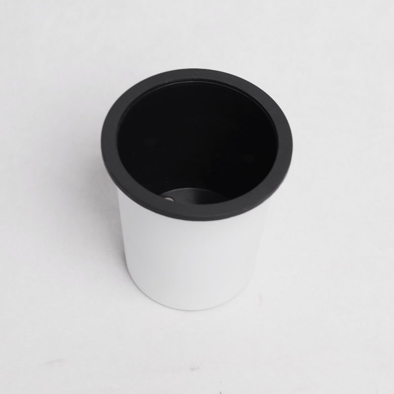 Top view of the Oslo, a round white, self watering indoor planter made from plastic that you can buy online at Sukham Home, a sustainable furniture, gardening and home decor store in Kolkata, India