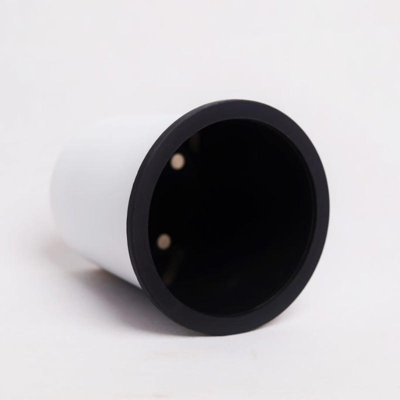 Close up of the rim of the Oslo, a round white, self watering indoor planter made from plastic that you can buy online at Sukham Home, a sustainable furniture, gardening and home decor store in Kolkata, India
