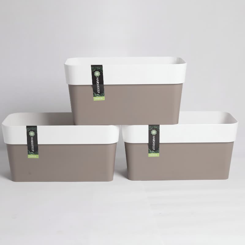 Stacked together, Arty Rectangle, a rectangle white and brown indoor hanging planter made from plastic that you can buy online at Sukham Home, a sustainable furniture, gardening and home decor store in Kolkata, India