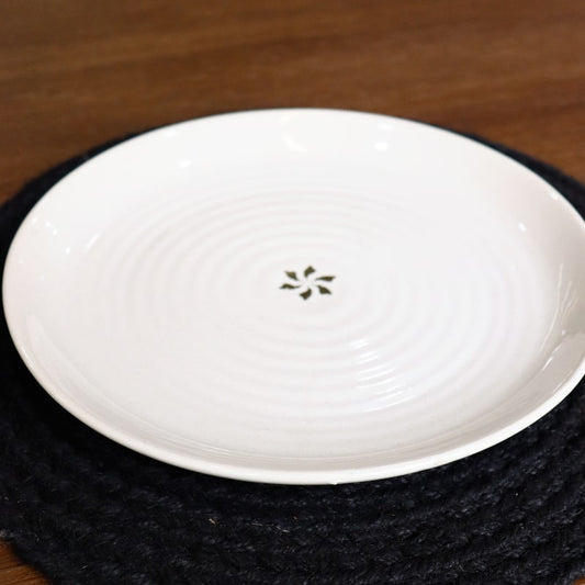 Rim of the Ivory Ganga Dinner Plate, a pure white and 24-karat gold ceramic plate you can buy online at Sukham Home, a sustainable furniture, gardening and home decor store in Kolkata, India