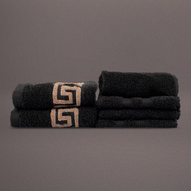 Embroidered hand and face towels from the Black Silly-Cuddly, a set of 8 black & gold towels you can buy online at Sukham Home, a sustainable furniture, kitchen & dining and home decor store in Kolkata, India