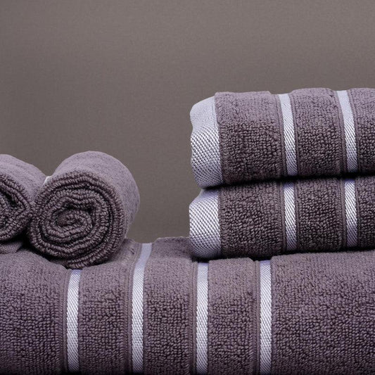 Close up of the design on the Grey Oh-So-Soft, a set of 6 purple towels, you can buy online at Sukham Home, a sustainable furniture, kitchen & dining and home decor store in Kolkata, India