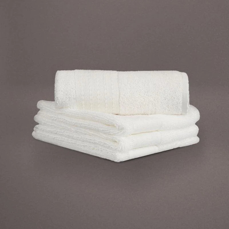 Face towels from the White Silly-Cuddly, a set of 8 white floral towels you can buy online at Sukham Home, a sustainable furniture, kitchen & dining and home decor store in Kolkata, India