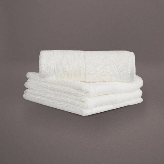 Face towels from the White Silly-Cuddly, a set of 8 white floral towels you can buy online at Sukham Home, a sustainable furniture, kitchen & dining and home decor store in Kolkata, India
