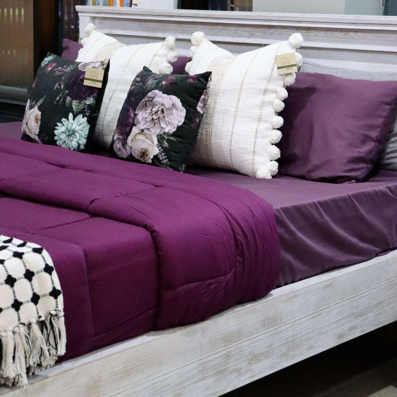 Jewel-toned bed linen collection at Su-Kham Home, a sustainable furniture, kitchen & dining and home decor store in Kolkata, India
