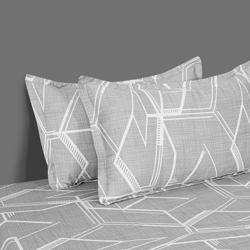 Pillowcases of Architectural Dreams, a printed grey geometrical king size bedsheet you can buy online at Sukham Home, a sustainable furniture, gardening and home decor store in Kolkata, India