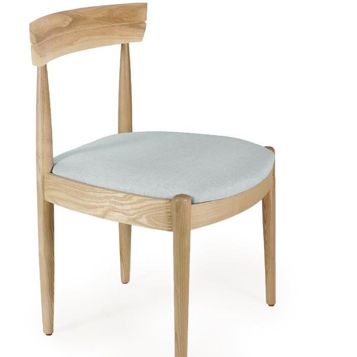 Wooden Bow chair with a light blue cushion on a white background