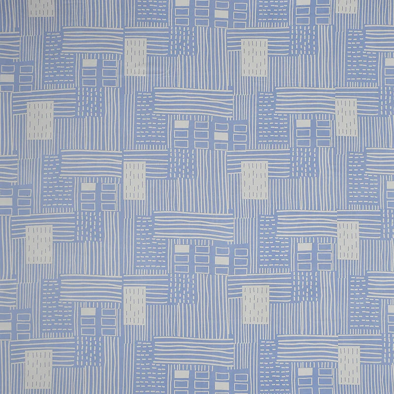 Close up of the bedsheet geometric pattern on the Cerulean Shores, a printed blue geometric queen size bedsheet you can buy online at Sukham Home, a sustainable furniture, gardening and home decor store in Kolkata, India