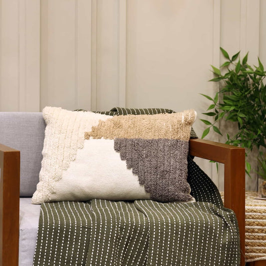 The Creme Brulee Cushion, a rectangle accent pillow with soft and sweet course colours you can buy online at Sukham Home, a sustainable furniture, kitchen & dining and home decor store in Kolkata, India.