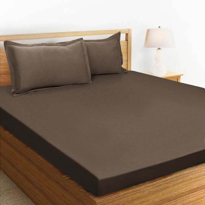 Spread on a bed, the Espresso Shot, a solid brown super king size bedsheet you can buy online at Sukham Home, a sustainable furniture, gardening and home decor store in Kolkata, India