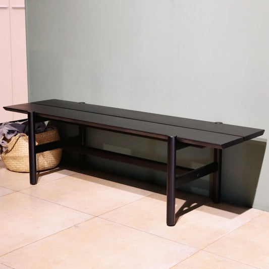 Front view of the Wait Bench in Ash Charcoal, a solid wood outdoor seat you can buy online at Sukham Home, a sustainable furniture and home decor store in Kolkata, India