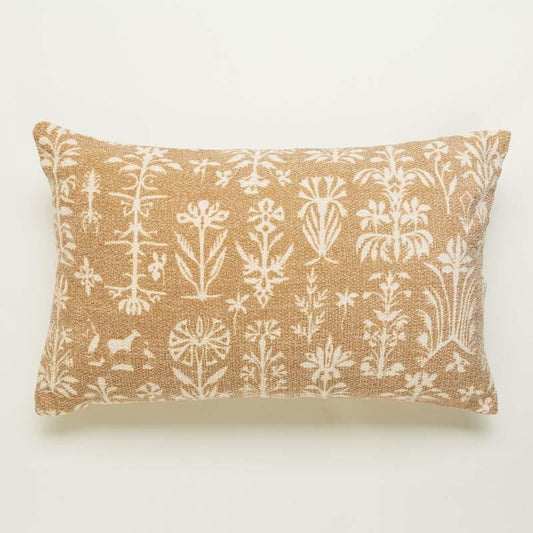The Panchatantra Tales Cushion, a rectangle accent pillow with indie folk patterns you can buy online at Sukham Home, a sustainable furniture, kitchen & dining and home decor store in Kolkata, India.