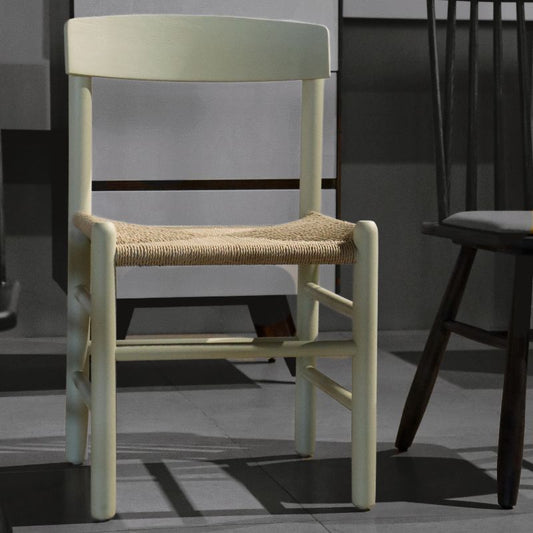 The PU Mint Green finish People's, a solid oak wood chair with a danish cord seat you can buy online at Sukham Home, a sustainable furniture and home decor store in Kolkata, India