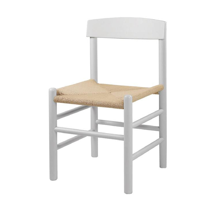 White People's Chair with a natural woven seat on a white background