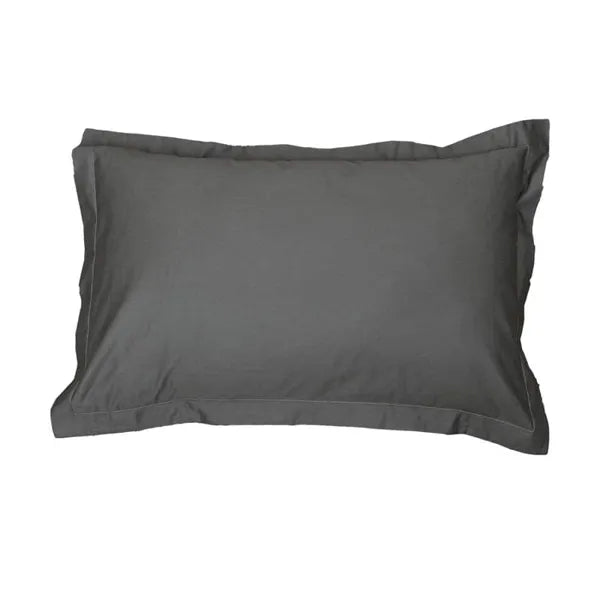 Picture of the pillowcase of the Stormy Skies, a solid grey super king size bedsheet you can buy online at Sukham Home, a sustainable furniture, gardening and home decor store in Kolkata, India