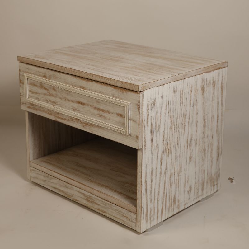 Side view of the Archaic Bedside Table, a wooden white patina nightstand inspired by harbour and coastal style furniture you can buy online at Sukham Home, a sustainable furniture, kitchen & dining and home decor store in Kolkata, India