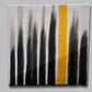 Against a grey background, The Light I Seek painting, a yellow, black and white canvas artwork you can buy online at Sukham Home, a sustainable furniture, kitchen & dining and home decor store in Kolkata, India