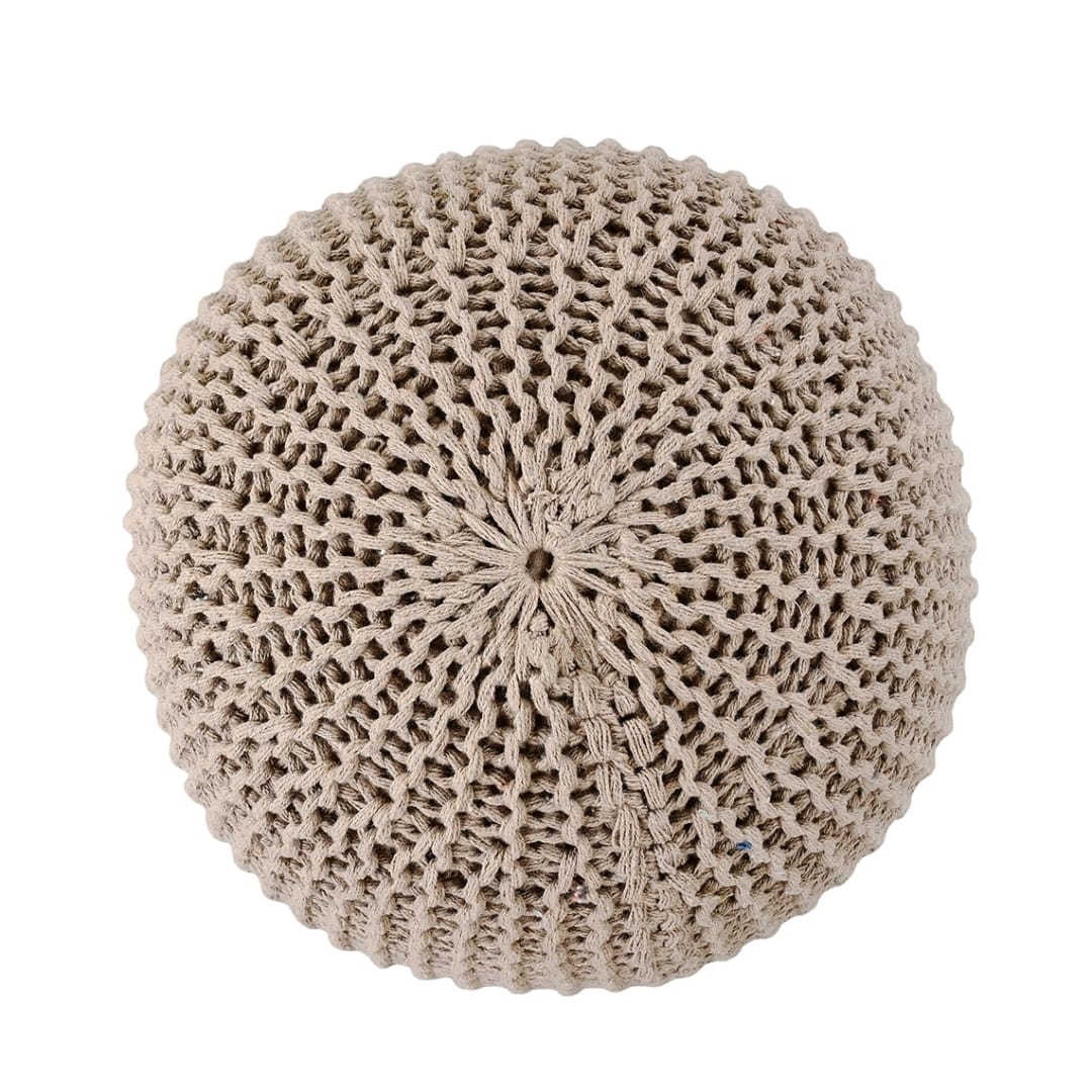 Against a white background, top view of the Beige Knitted Pouf, an sandy brown ottoman made from cotton, available at Sukham Home, a sustainable furniture, kitchen & dining and home decor store in Kolkata, India