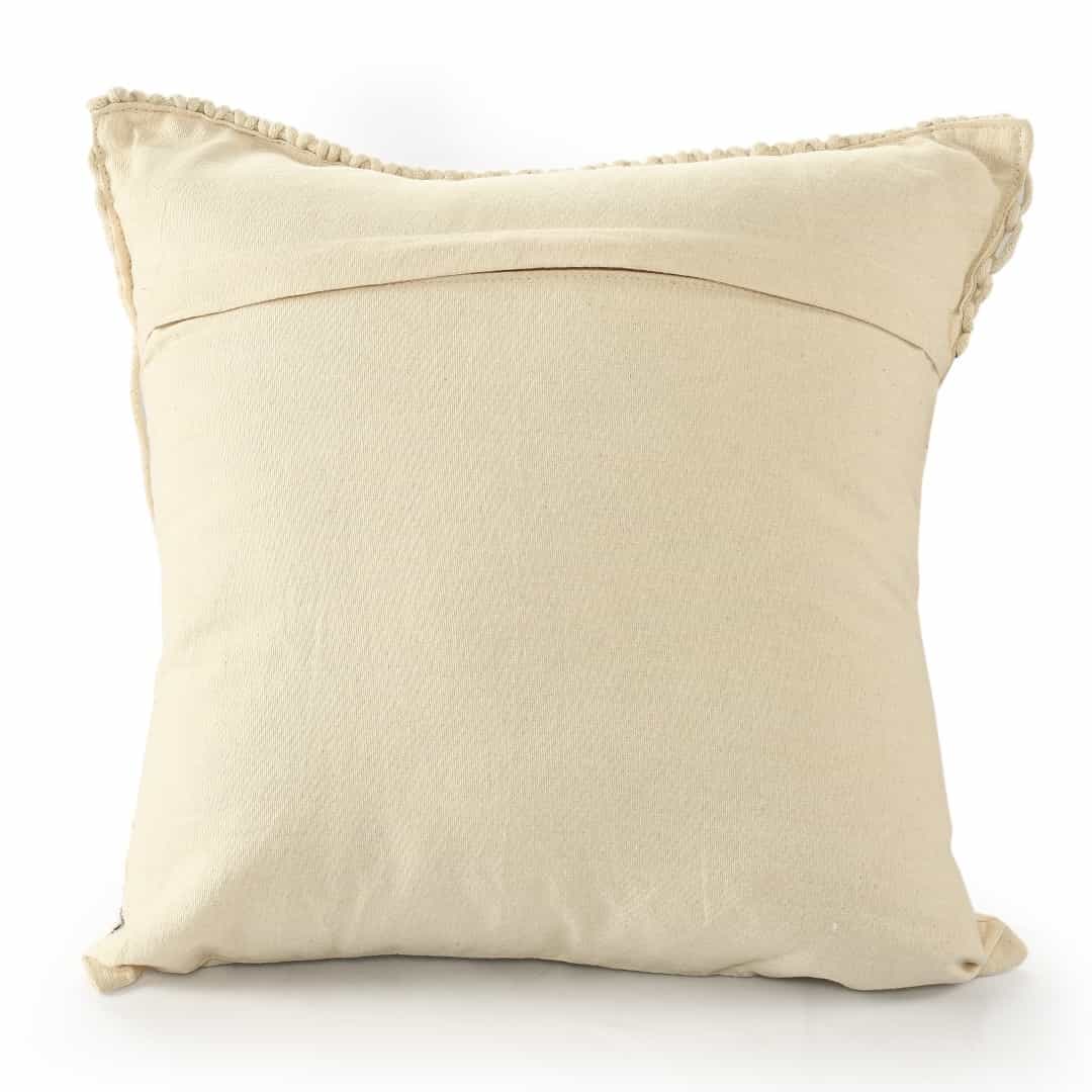 Against a white background, the back of the Beige White Macrame Cushion with Fringes, a square accent pillow you can buy online at Sukham Home, a sustainable furniture, kitchen & dining and home decor store in Kolkata, India