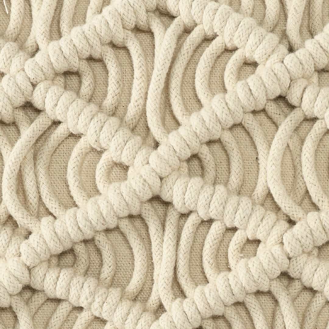 Close up of the texture and design of the Beige White Macrame Cushion, a square accent pillow you can buy online at Sukham Home, a sustainable furniture, kitchen & dining and home decor store in Kolkata, India