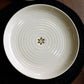 Top view of the Beige Ganga Dinner Plate - a beige and 24-karat gold ceramic plate you can buy online at Sukham Home, a sustainable furniture, gardening and home decor store in Kolkata, India