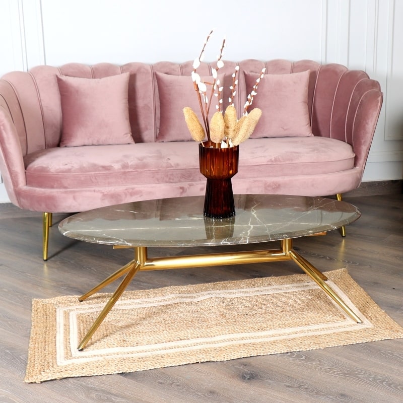 Under a coffee table in the living room, the Rectangular Jute Rug with White Accents, a small rectangle jute and beige cotton carpet you can buy online at Sukham Home, a sustainable furniture, kitchen & dining and home decor store in Kolkata, India