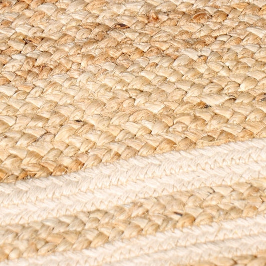 Close up of the braided texture on the Rectangular Jute Rug with White Accents, a small rectangle jute and beige cotton carpet you can buy online at Sukham Home, a sustainable furniture, kitchen & dining and home decor store in Kolkata, India