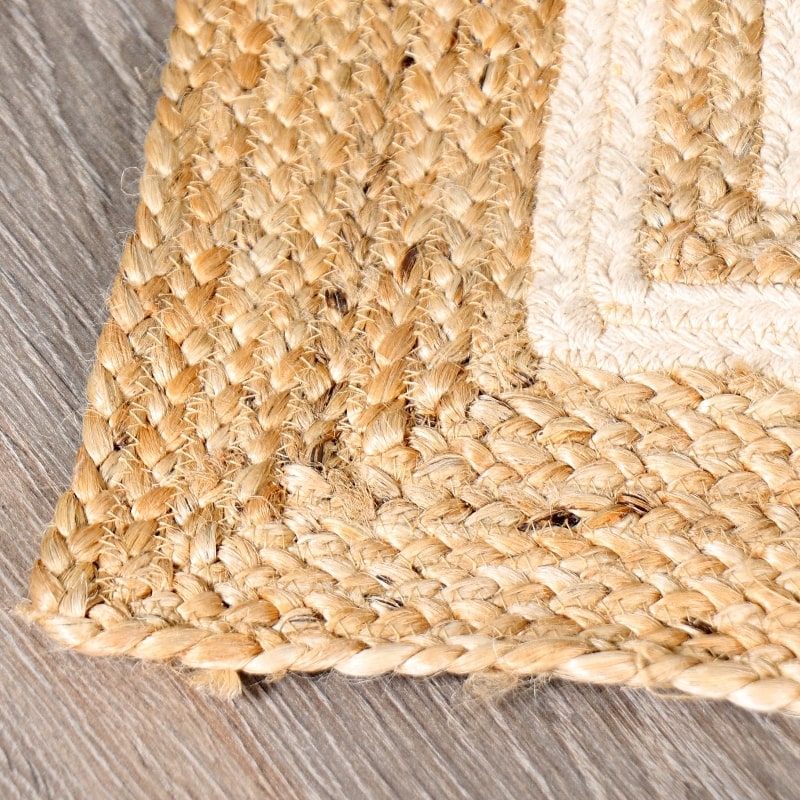 Corner finishing of the Rectangular Jute Rug with White Accents, a small rectangle jute and beige cotton carpet you can buy online at Sukham Home, a sustainable furniture, kitchen & dining and home decor store in Kolkata, India