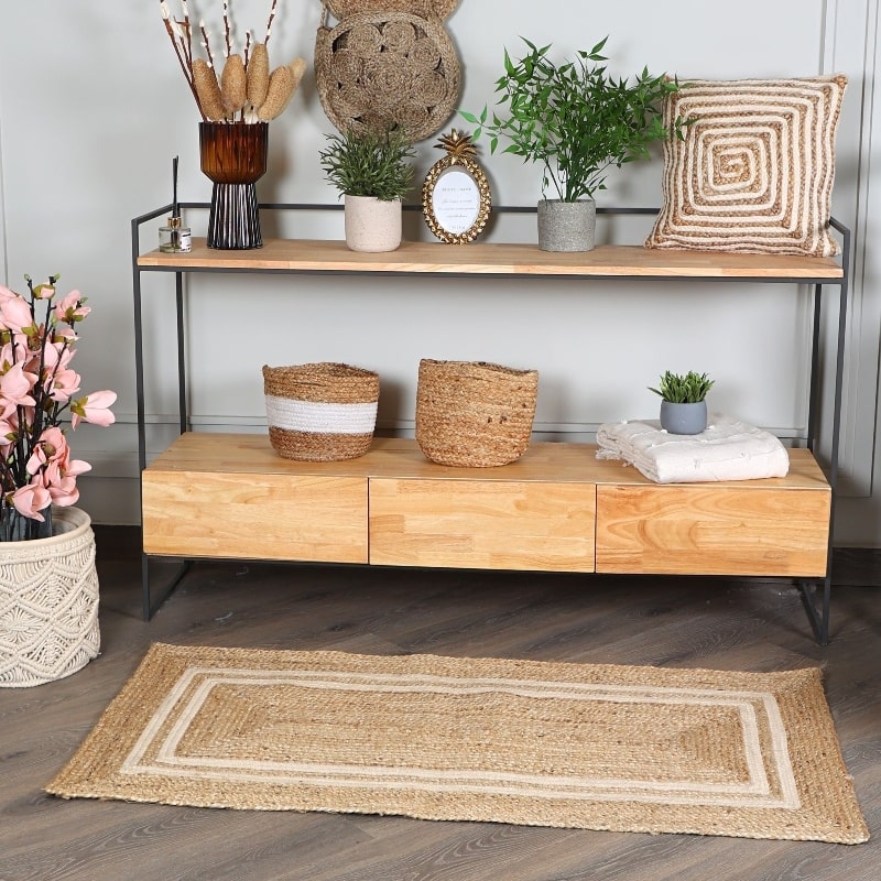 Below a console, the Rectangular Jute Rug with White Accents, a small rectangle jute and beige cotton carpet you can buy online at Sukham Home, a sustainable furniture, kitchen & dining and home decor store in Kolkata, India