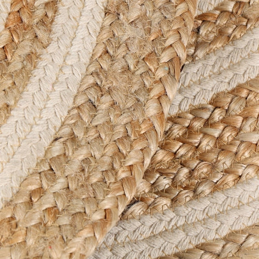 Close up of the woven pattern on the Round Jute Rug, a circular jute and white cotton carpet you can buy online at Sukham Home, a sustainable furniture, kitchen & dining and home decor store in Kolkata, India