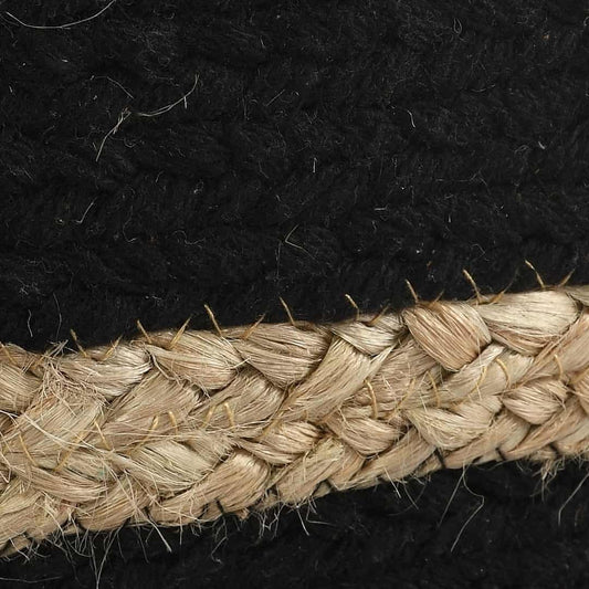 Close up of the texture and braiding on the Jute Pouf with Black Accent, a braided and stitched ottoman made from jute & cotton, available at Sukham Home, a sustainable furniture, kitchen & dining and home decor store in Kolkata, India