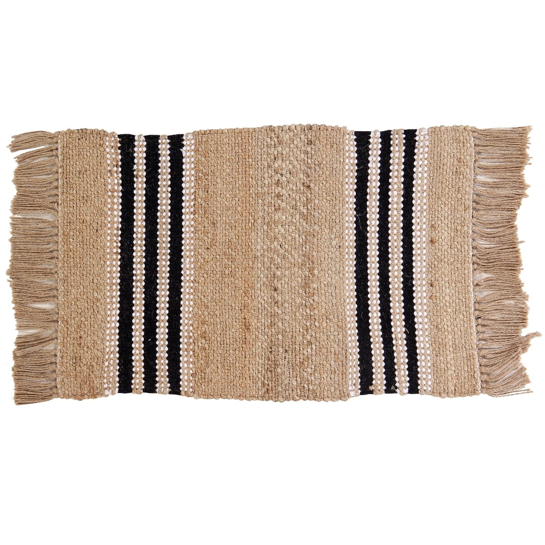 Against a white background, the Handwoven Jute Rug with Black and White Stripes and Tassels, a small rectangle jute and black & white cotton carpet you can buy online at Sukham Home, a sustainable furniture, kitchen & dining and home decor store in Kolkata, India