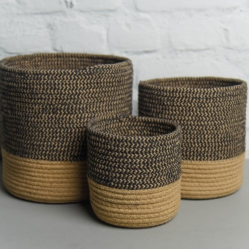 All three baskets in the Black Basket Set, a set of 3 black jute & cotton baskets you can buy online at Sukham Home, a sustainable furniture, kitchen & dining and home decor store in Kolkata, India