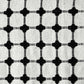 Close up of the woven pattern on the Black and White Cotton Bedcover Throw you can buy online at Sukham Home, a sustainable furniture, kitchen & dining and home decor store in Kolkata, India